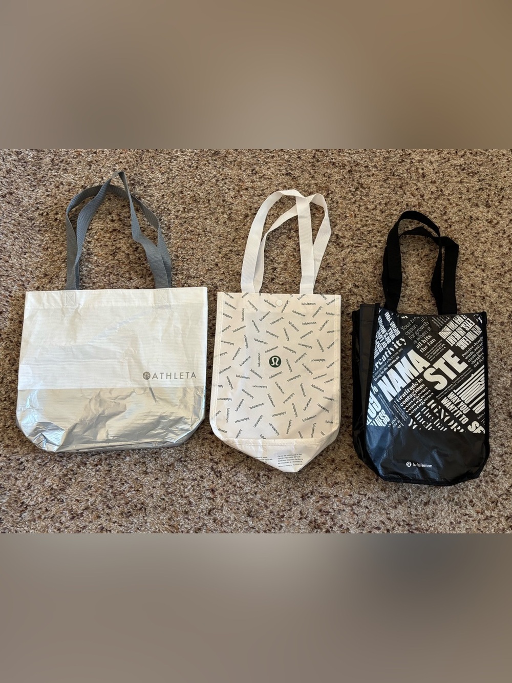 Set of 2 lululemon bags and 1 Athleta bag